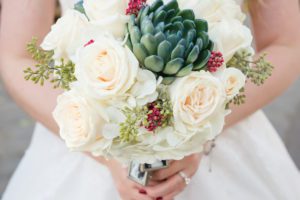 White roses and succulents bouquet