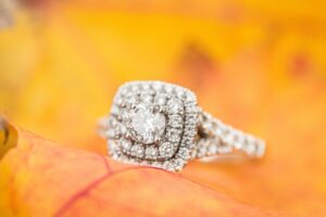 square engagement ring with many diamonds