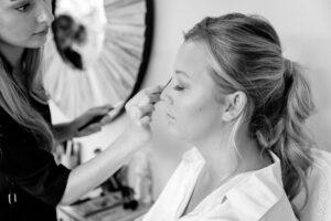 bride gets makeup done at Strathmere spa