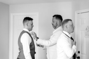 groomsmen getting ready at Strathmere in "the corner" rooms