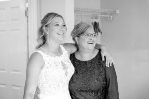 bride and mom before ceremony at Strathmere wedding in "the corner" rooms