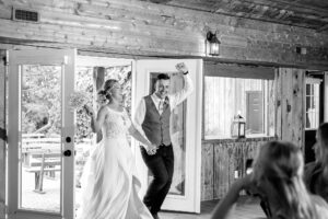 bride and groom entrance at wedding reception