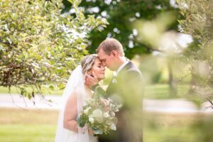 Bride and Groom portraits during romantic farm wedding in Winchester, ON