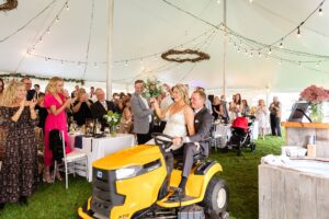 Wedding reception in tent at family farm wedding
