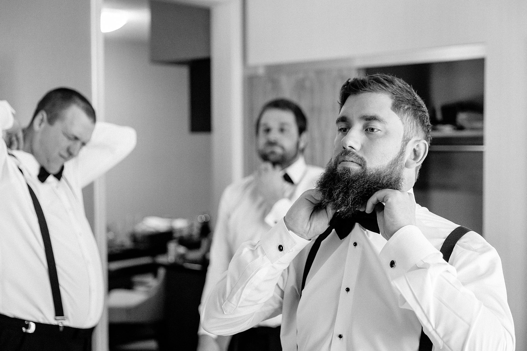 groomsmen getting ready at Best Western for code's mill wedding in Perth, ON