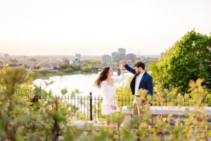 Couple dancing during Downtown Ottawa Engagement Pictures overlooking the Ottawa River
