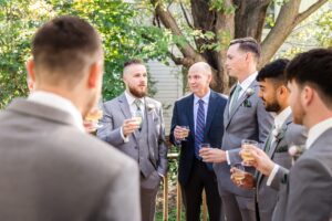 groom and groomsmen toast before the ceremony