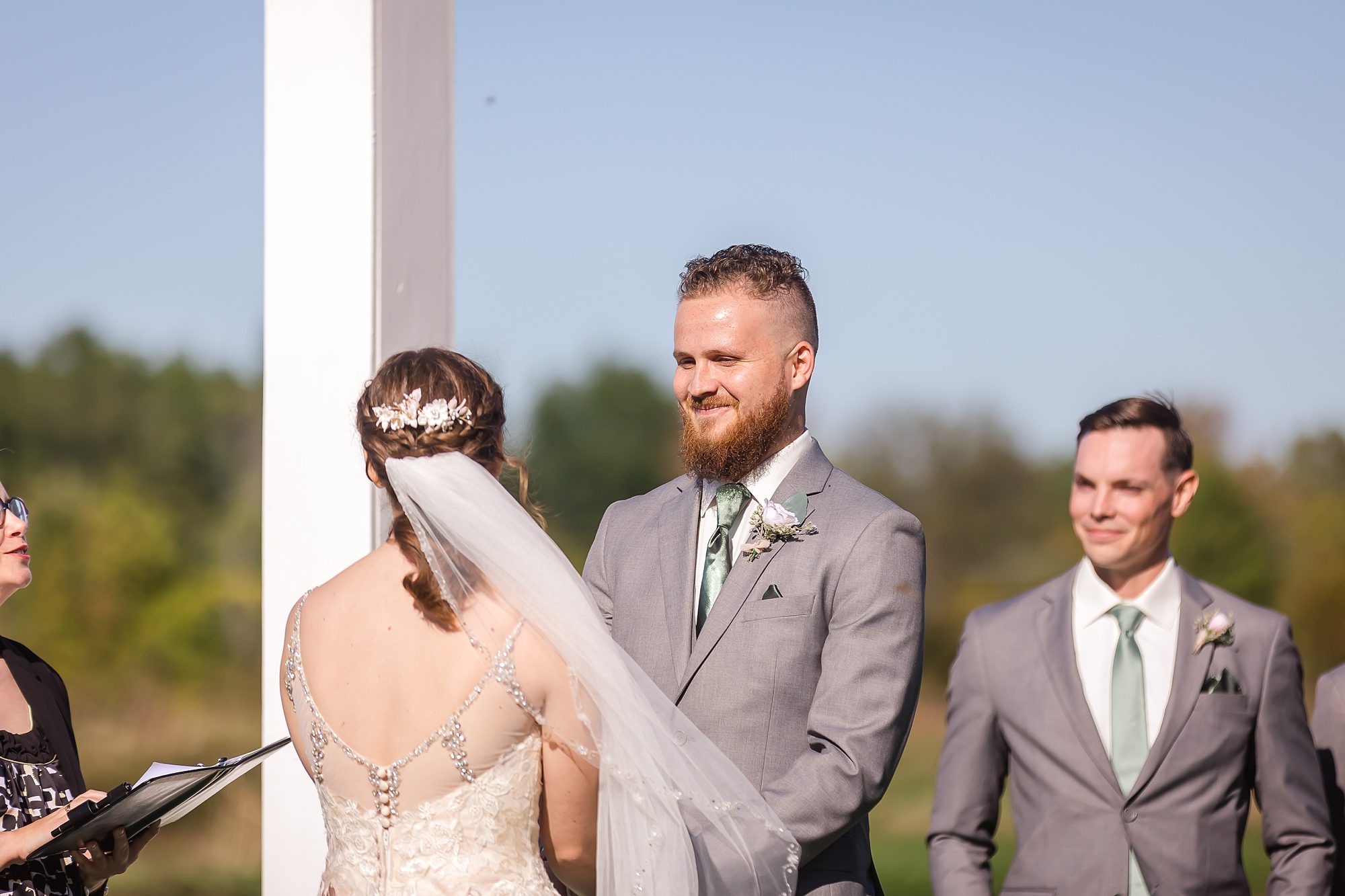 sunny outdoor wedding ceremony in the country