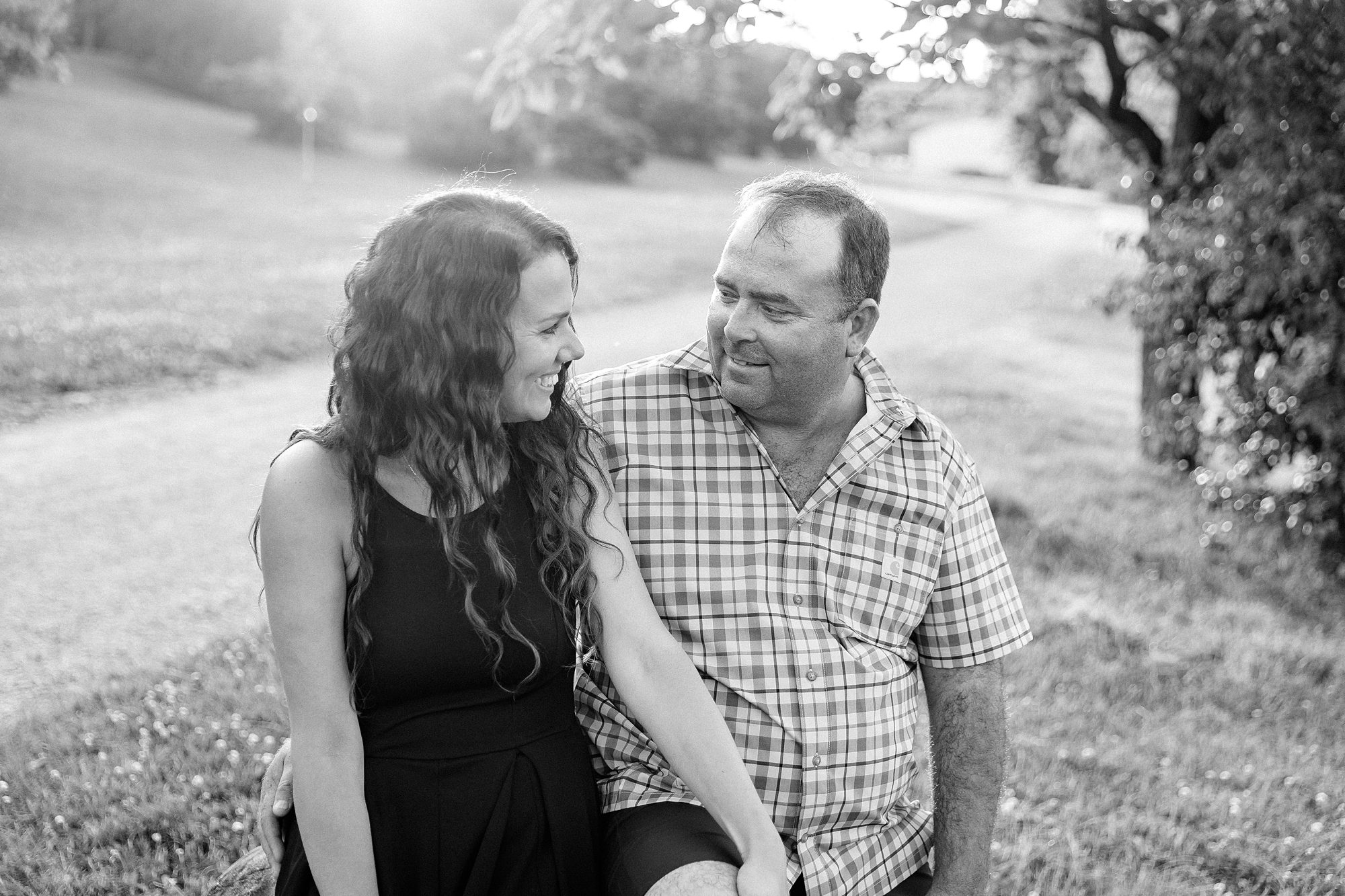 black and white engagement portraits during golden hour